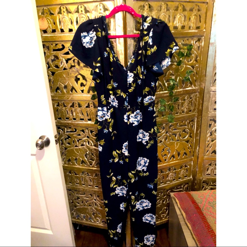 Francesca’s Navy Floral Short Sleeve Jumpsuit